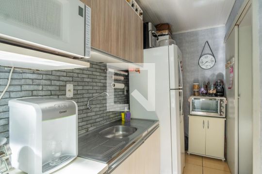 Cozinha de apartamento à venda com 2 quartos, 52m² em Vila Nova, Porto Alegre