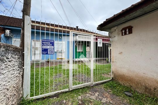 Plaquinha fachada de casa de condomínio para alugar com 4 quartos, 104m² em Centro, São Leopoldo