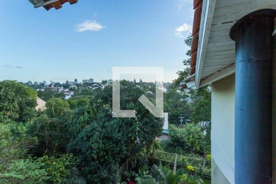 Vista de casa à venda com 4 quartos, 344m² em Chácara das Pedras, Porto Alegre