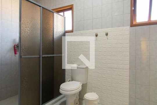 Banheiro da Suíte de casa à venda com 4 quartos, 240m² em Niterói, Canoas