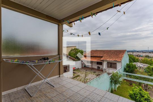Varanda da Sala de casa à venda com 3 quartos, 172m² em Parque Santa Fé, Porto Alegre