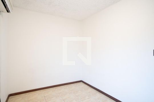 Quarto de apartamento à venda com 1 quarto, 50m² em Vila Nova, Porto Alegre