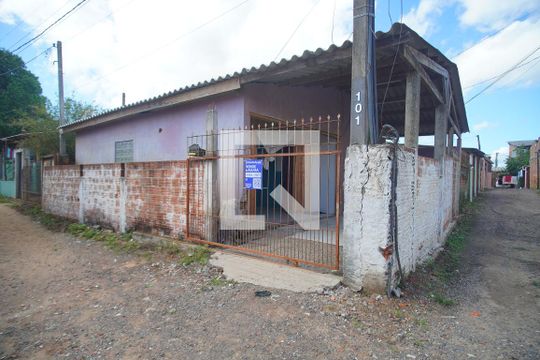 Fachada + Plaquinha  de casa à venda com 2 quartos, 60m² em Santo Afonso, Novo Hamburgo