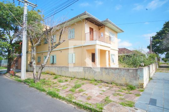Fachada Lateral de casa à venda com 9 quartos, 520m² em Sarandi, Porto Alegre