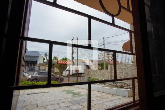 Quarto 1 - Vista de casa à venda com 5 quartos, 188m² em Sarandi, Porto Alegre