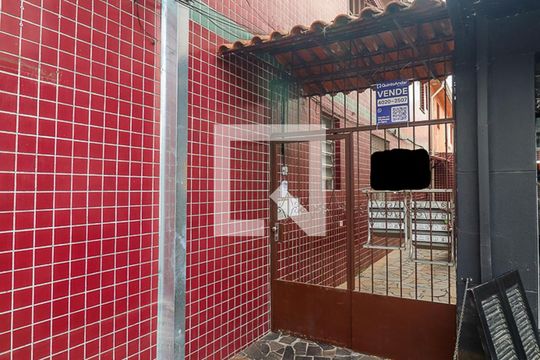 Fachada e Placa de apartamento à venda com 1 quarto, 56m² em São Geraldo, Porto Alegre