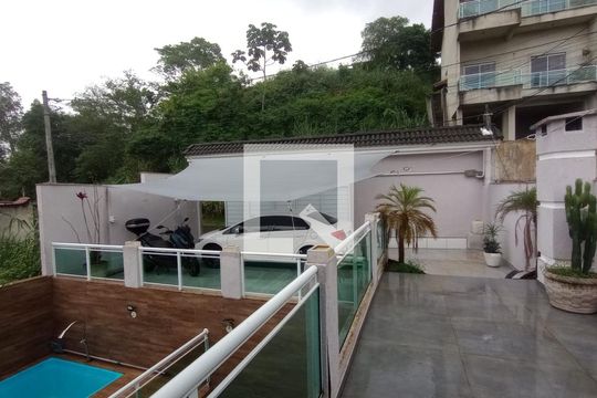 Garagem de casa de condomínio à venda com 5 quartos, 350m² em Tauá, Rio de Janeiro