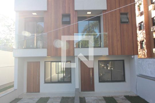 Fachada de casa de condomínio à venda com 3 quartos, 167m² em Tristeza, Porto Alegre