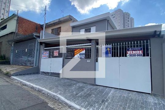 Fachada e placa de casa à venda com 3 quartos, 150m² em Jardim Dourado, Guarulhos