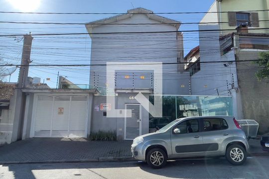 Fachada + Placa de casa de condomínio para alugar com 4 quartos, 154m² em Vila Taquari, São Paulo