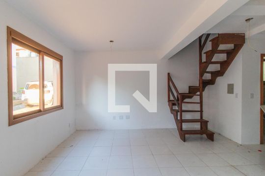 Sala de casa de condomínio à venda com 2 quartos, 130m² em Ipanema, Porto Alegre