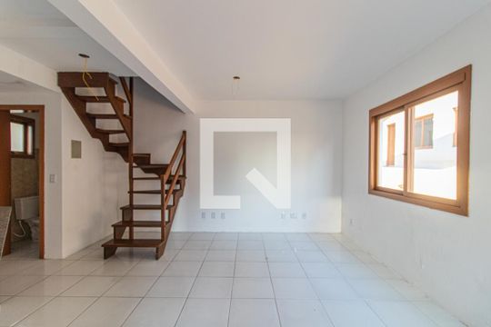 Sala de casa de condomínio à venda com 2 quartos, 130m² em Ipanema, Porto Alegre