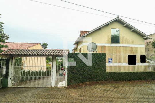 Fachada de casa de condomínio à venda com 3 quartos, 179m² em Jardim Floresta, Porto Alegre