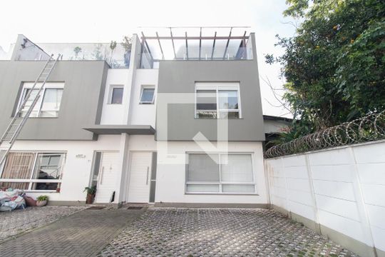 Fachada de casa de condomínio à venda com 3 quartos, 197m² em Glória, Porto Alegre