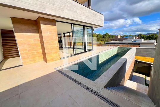 Vista Sala de casa à venda com 3 quartos, 874m² em Alphaville Nova Lima, Nova Lima