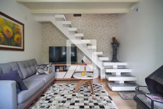 Sala de casa de condomínio à venda com 2 quartos, 90m² em Rondônia, Novo Hamburgo