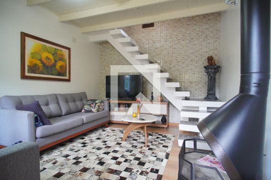 Sala de casa de condomínio à venda com 2 quartos, 90m² em Rondônia, Novo Hamburgo