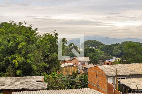 Quarto 1 de casa à venda com 3 quartos, 90m² em Vila Nova, Porto Alegre