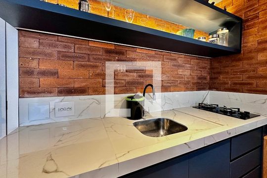 Cozinha de apartamento à venda com 1 quarto, 32m² em Jardim Caravelas, São Paulo