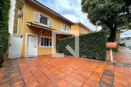 Fachada de casa de condomínio à venda com 4 quartos, 220m² em Jardim Monte Alegre, São Paulo