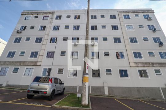 Fachada do bloco e placa de apartamento à venda com 2 quartos, 47m² em Chácara das Pedras, Porto Alegre