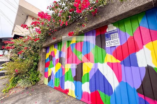 Fachada e placa de casa à venda com 3 quartos, 250m² em Santa Cruz Industrial, Contagem