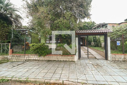 Fachada de casa para alugar com 4 quartos, 238m² em Jardim Itu, Porto Alegre
