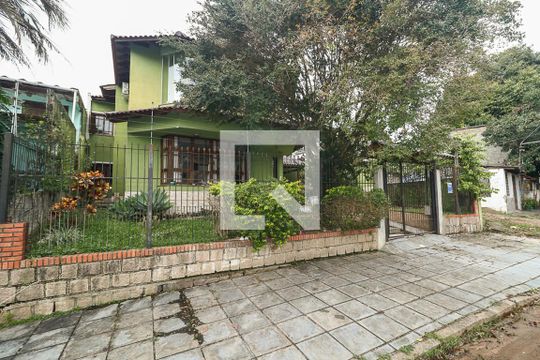 Fachada de casa para alugar com 4 quartos, 238m² em Jardim Itu, Porto Alegre