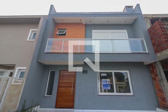 Fachada de casa de condomínio à venda com 3 quartos, 142m² em Hípica, Porto Alegre