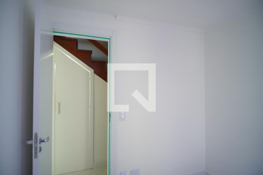 Quarto 1 de casa de condomínio à venda com 3 quartos, 84m² em Humaitá, Porto Alegre