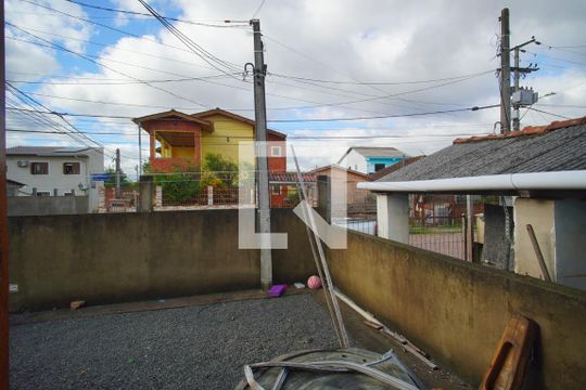 Quarto 1 - Vista de casa à venda com 2 quartos, 100m² em Humaitá, Porto Alegre