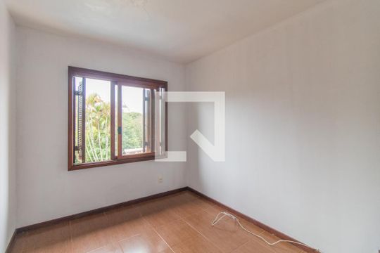 Quarto 1 de casa para alugar com 3 quartos, 200m² em Ipanema, Porto Alegre