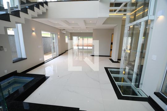 Sala 1 de casa de condomínio à venda com 4 quartos, 402m² em Alphaville Dom Pedro, Campinas