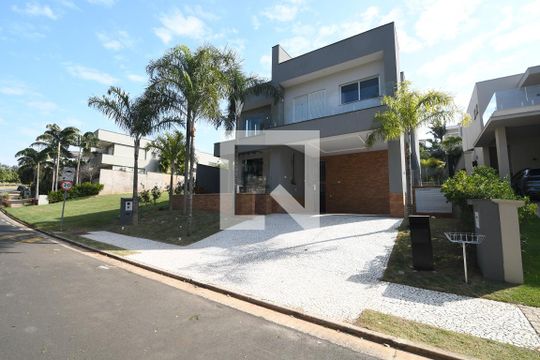Fachada de casa de condomínio à venda com 4 quartos, 402m² em Alphaville Dom Pedro, Campinas