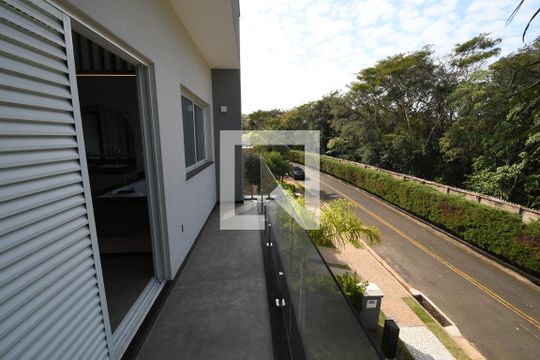 Quarto 3 - Suíte Sacada de casa de condomínio à venda com 4 quartos, 402m² em Alphaville Dom Pedro, Campinas