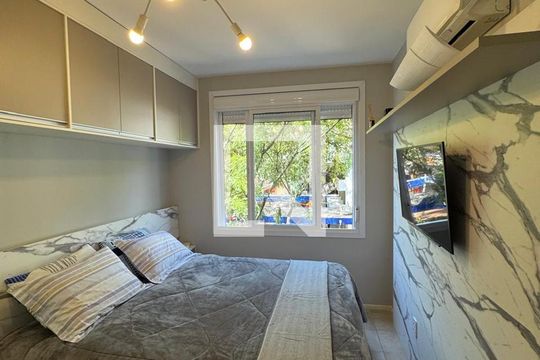 Quarto 1 de apartamento à venda com 2 quartos, 81m² em Santo Antônio, Porto Alegre