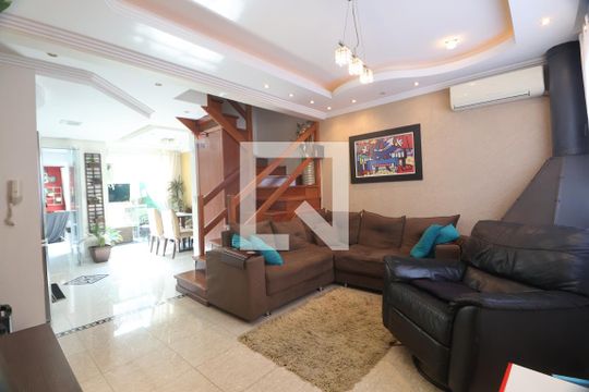 Sala de casa de condomínio para alugar com 2 quartos, 80m² em Marechal Rondon, Canoas
