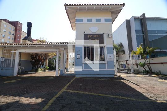 Fachada e portaria de casa de condomínio para alugar com 2 quartos, 80m² em Marechal Rondon, Canoas