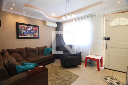 Sala de casa de condomínio à venda com 2 quartos, 80m² em Marechal Rondon, Canoas
