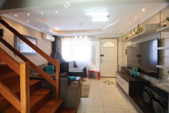 Sala de casa de condomínio para alugar com 2 quartos, 80m² em Marechal Rondon, Canoas