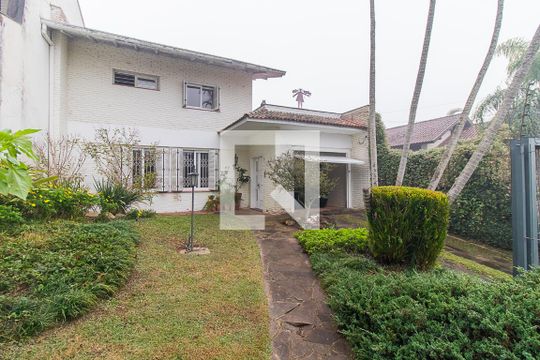 Fachada de casa à venda com 3 quartos, 400m² em Santa Tereza, Porto Alegre