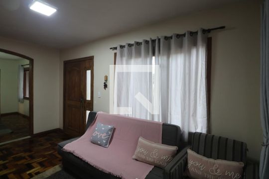 Sala de TV de casa à venda com 3 quartos, 200m² em Harmonia, Canoas