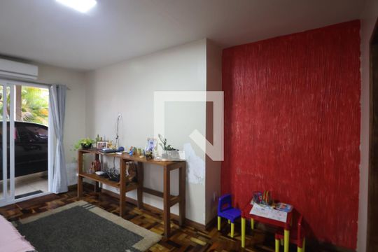 Sala de TV de casa à venda com 3 quartos, 200m² em Harmonia, Canoas