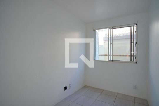 Quarto 1 de casa de condomínio à venda com 3 quartos, 72m² em Sarandi, Porto Alegre