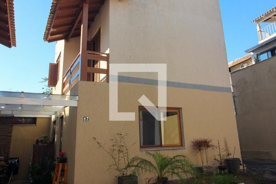 Fachada de casa de condomínio à venda com 3 quartos, 172m² em Ipanema, Porto Alegre