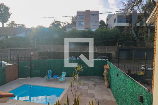 Vista da Suíte de casa de condomínio à venda com 3 quartos, 222m² em Vila Conceição, Porto Alegre
