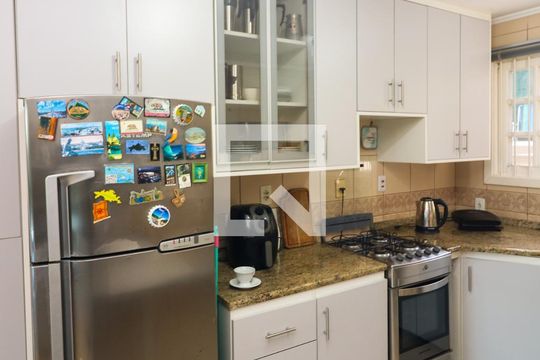 Cozinha de casa de condomínio à venda com 3 quartos, 222m² em Vila Conceição, Porto Alegre