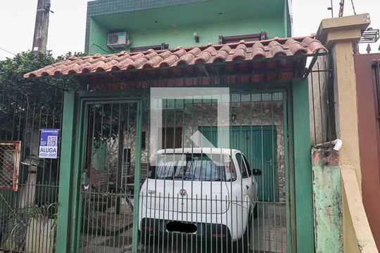 Fachada de casa à venda com 3 quartos, 140m² em Costa E Silva, Porto Alegre