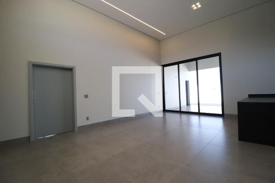Sala de casa de condomínio para alugar com 3 quartos, 212m² em Laranjeiras, Uberlândia