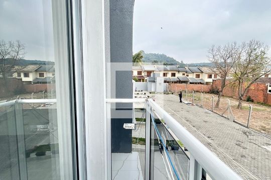 Sacada - Quarto 1 de casa à venda com 2 quartos, 67m² em São Jorge, Novo Hamburgo